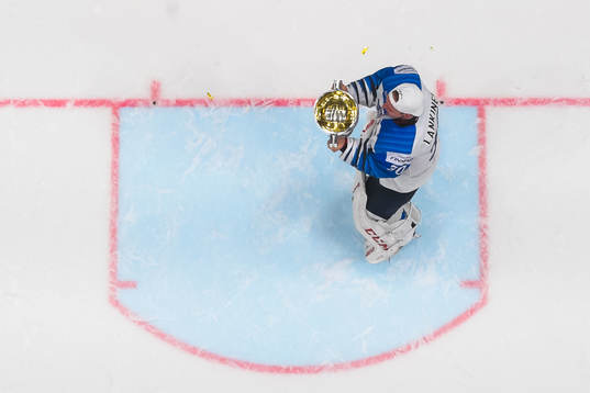 Goaltender Kevin Lankinen of Finland celebrates with the