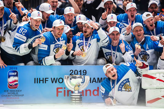 Players of Finland celebrates with the trophy