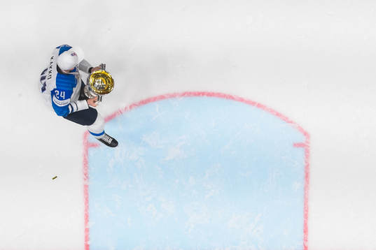 Kaapo Kakko of Finland celebrate with the trophy