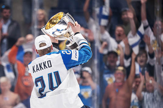 Kaapo Kakko of Finland celebrates with the trophy