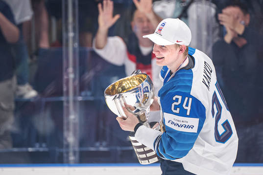 Kaapo Kakko of Finland celebrates with the trophy