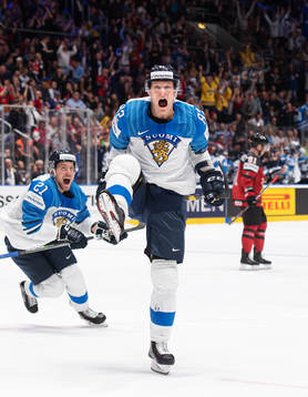 Juhani Tyrväinen and Harri Pesonen of Finland celebrate