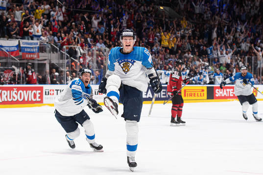 Juhani Tyrväinen and Harri Pesonen of Finland celebrate