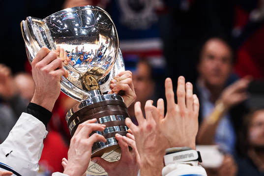 Players of Finland celebrate with the trophy