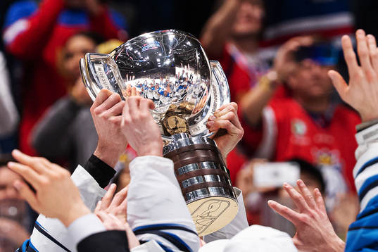 Players of Finland celebrate with the trophy