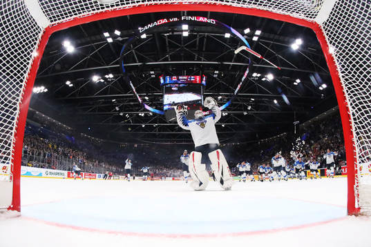Goaltender Kevin Lankinen of Finland celebrates his team's