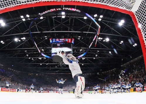 Goaltender Kevin Lankinen of Finland celebrates his team's