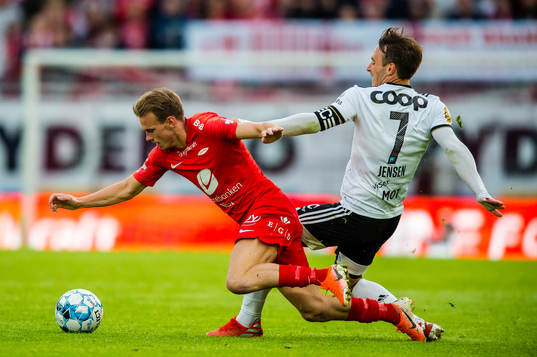Petter Strand of Brann and Mike Lindemann Jensen of