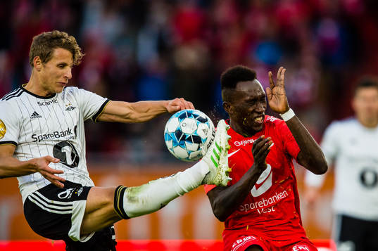 Vegar Eggen Hedenstad of Rosenborg and Karamoko Daouda