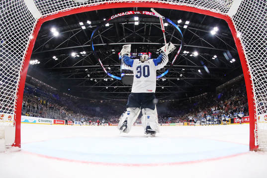 Goaltender Kevin Lankinen of Finland celebrates his team's