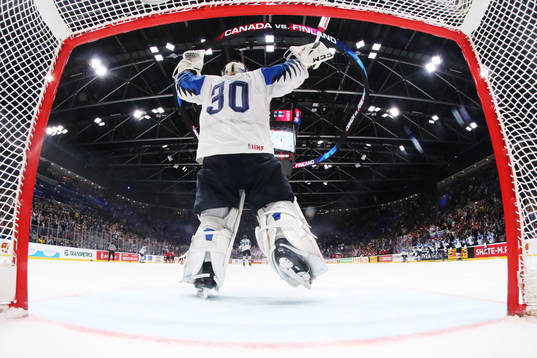 Goaltender Kevin Lankinen of Finland celebrates his team's