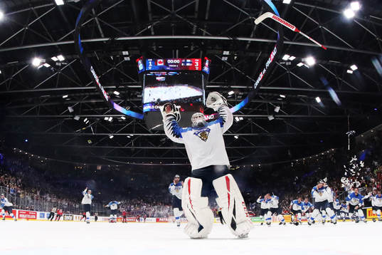 Goaltender Kevin Lankinen of Finland celebrates his team's