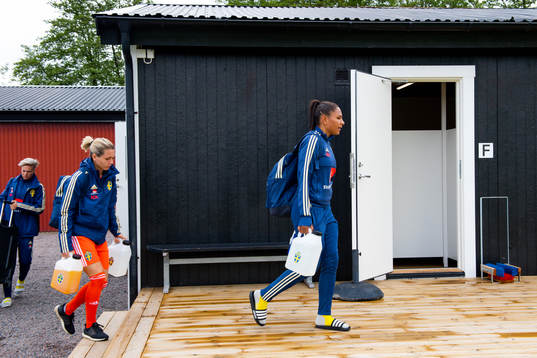 Madelen Janogy and goalkeeper Jennifer Falk  arrives to a