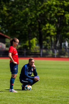 Guro Reiten of Norway and Martin Sjögren, head coach of