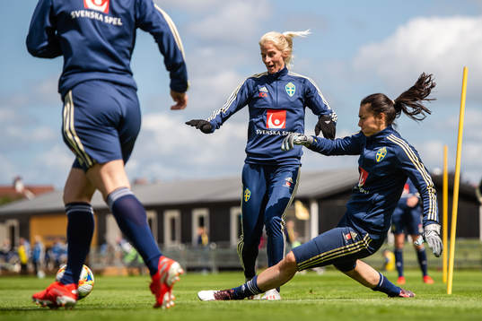 Sofia Jakobsson and goalkeeper Zecira Musovic of Swedish