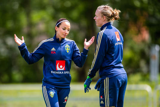 Kosovare Asllani and goalkeeper Hedvig Lindahl of Swedish