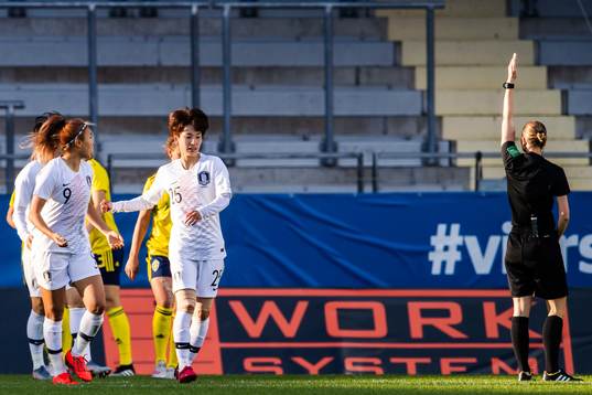 Mira Moon of South Korea looks dejected