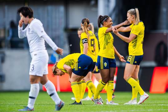 Madelen Janogy and Fridolina Rolfö of Sweden celebrate
