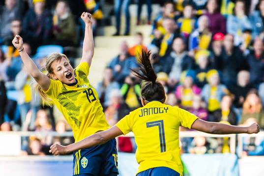 Anna Anvegård and Madelen Janogy of Sweden celebrate