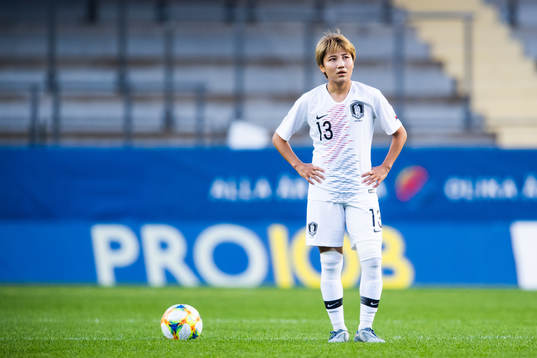 Minji Yeo of South Korea looks dejected