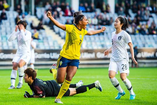 Madelen Janogy of Sweden celebrates