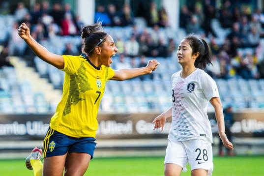 Madelen Janogy of Sweden celebrates