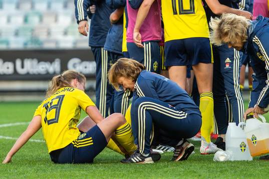 Anna Anvegård of Sweden receives treatment