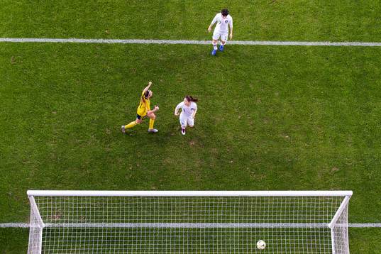 Kosovare Asllani of Sweden celebrates while Hwayeon Son and