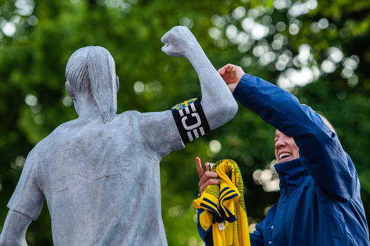 Caroline Seger of Sweden removes the captain's armband of