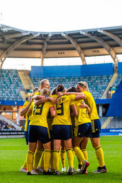 Madelen Janogy of Sweden celebrates with teammates