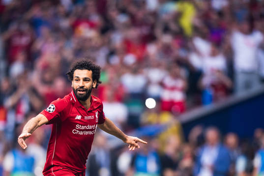 Mohamed Salah of Liverpool celebrates scoring 0-1