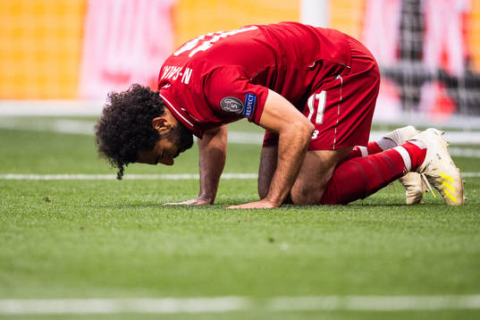 Mohamed Salah of Liverpool celebrates scoring 0-1