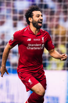 Mohamed Salah of Liverpool celebrates scoring 0-1