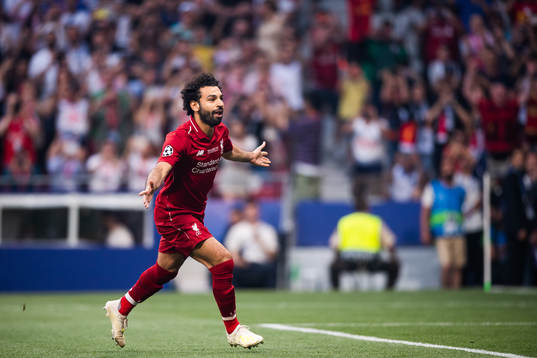 Mohamed Salah of Liverpool celebrates scoring 0-1