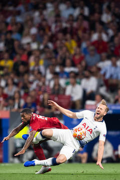 Georginio Wijnaldum of Liverpool and Harry Kane of