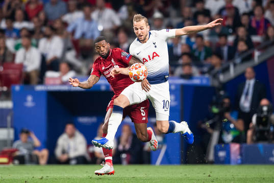 Georginio Wijnaldum of Liverpool and Harry Kane of