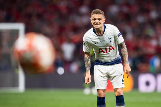 Kieran Trippier of Tottenham looks at the ball