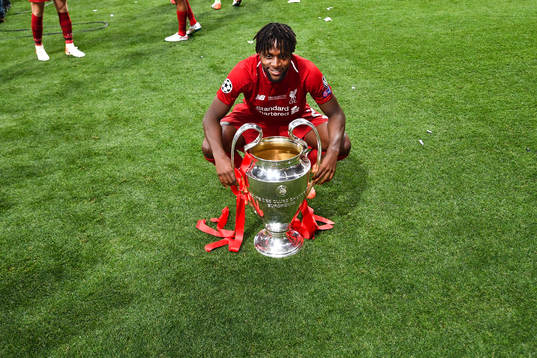 Divock Origi of Liverpool celebrate with the trophy