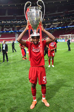Divock Origi of Liverpool celebrate with the trophy