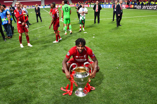 Divock Origi of Liverpool celebrate with the trophy