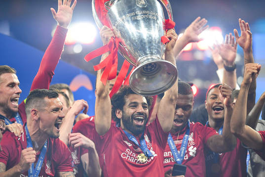 Mohamed Salah of Liverpool celebrate with the trophy