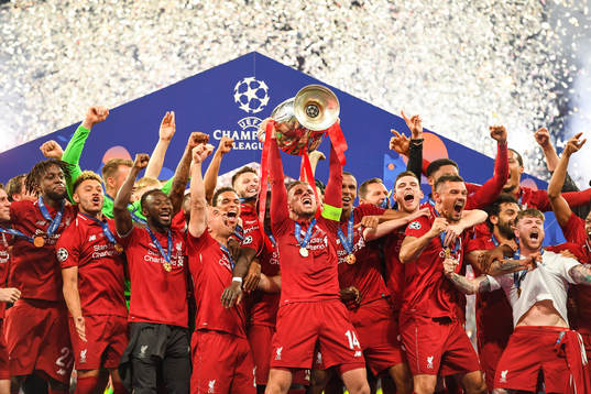 Jordan Henderson of Liverpool celebrate with the trophy