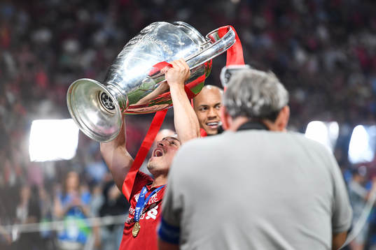 Xherdan Shaqiri of Liverpool celebrates with the trophy