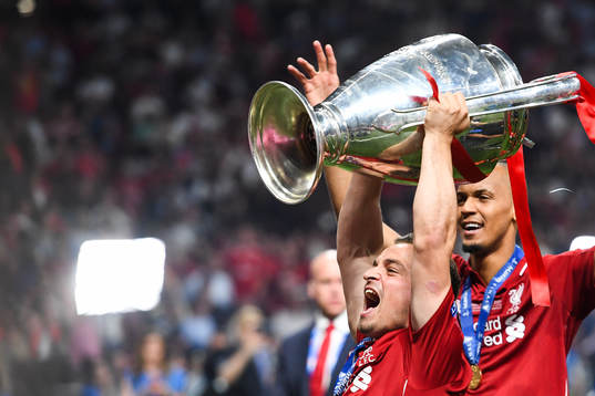 Xherdan Shaqiri of Liverpool celebrates with the trophy