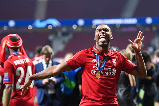Daniel Sturridge of Liverpool celebrate with the trophy
