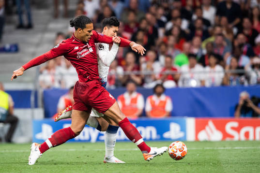 Virgil van Dijk of Liverpool and Heung-Min Son of Tottenham