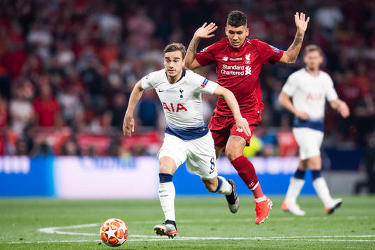 Harry Winks of Tottenham and Roberto Firmino of Liverpool