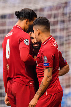 Mohamed Salah of Liverpool celebrates with Virgil van Dijk