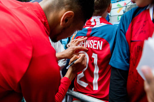 Bjørn Maars Johnsen of Norway signs his autograph