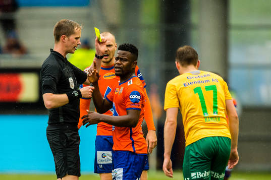 Izunna Arnest Uzochukwu of Aalesund gets a yellow card by
